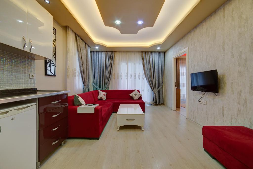 TV a/nebo společenská místnost v ubytování Mersin Vip House Hotel