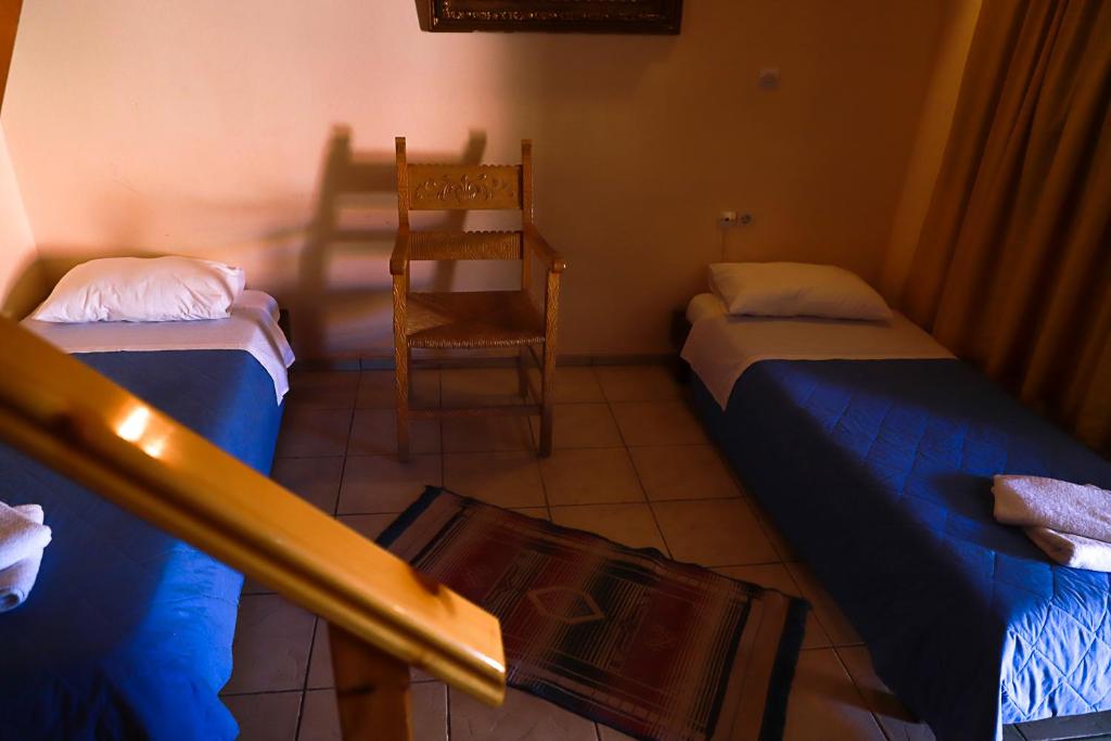 Postel nebo postele na pokoji v ubytování Pazinos Village Studios