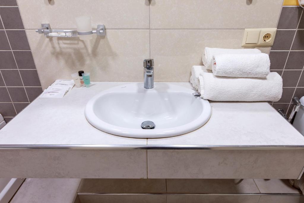 Ванна кімната в Kolkhida Resort & Spa