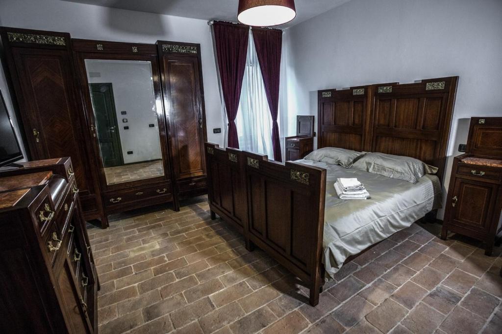 Posteľ alebo postele v izbe v ubytovaní Massignano 116