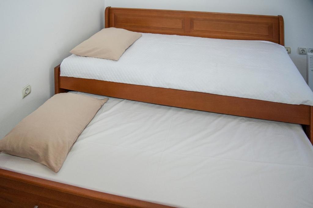 Postel nebo postele na pokoji v ubytování Apartments Mako