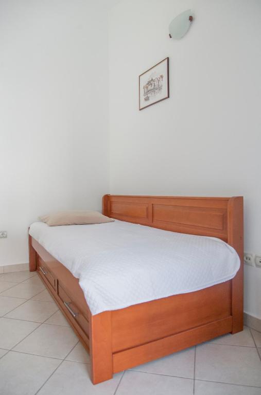 Postel nebo postele na pokoji v ubytování Apartments Mako