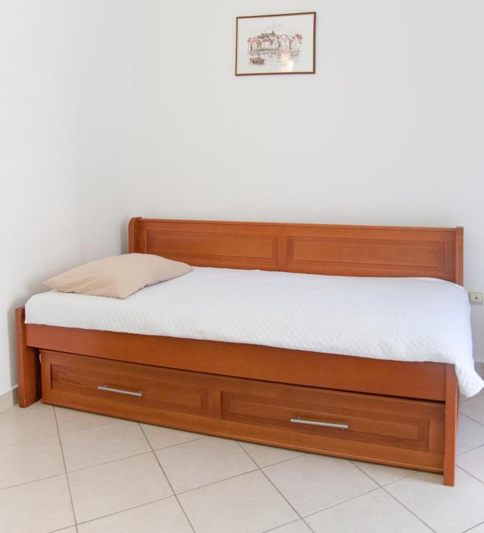 Postel nebo postele na pokoji v ubytování Apartments Mako