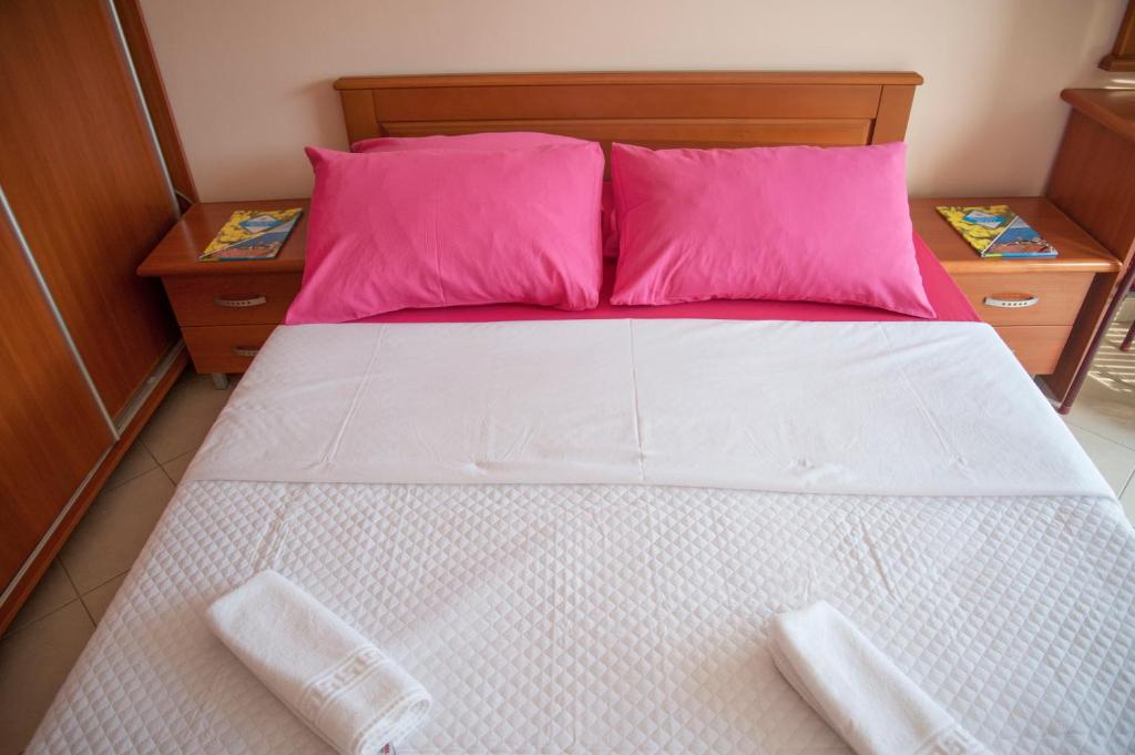 Postel nebo postele na pokoji v ubytování Apartments Mako