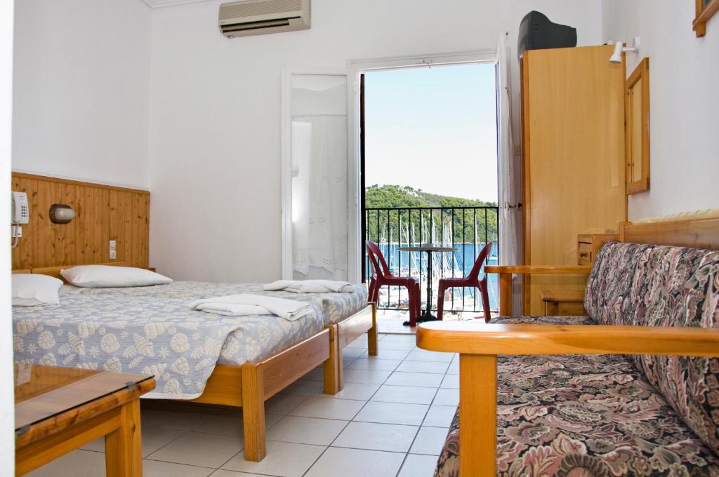 Postel nebo postele na pokoji v ubytování Hotel Christina