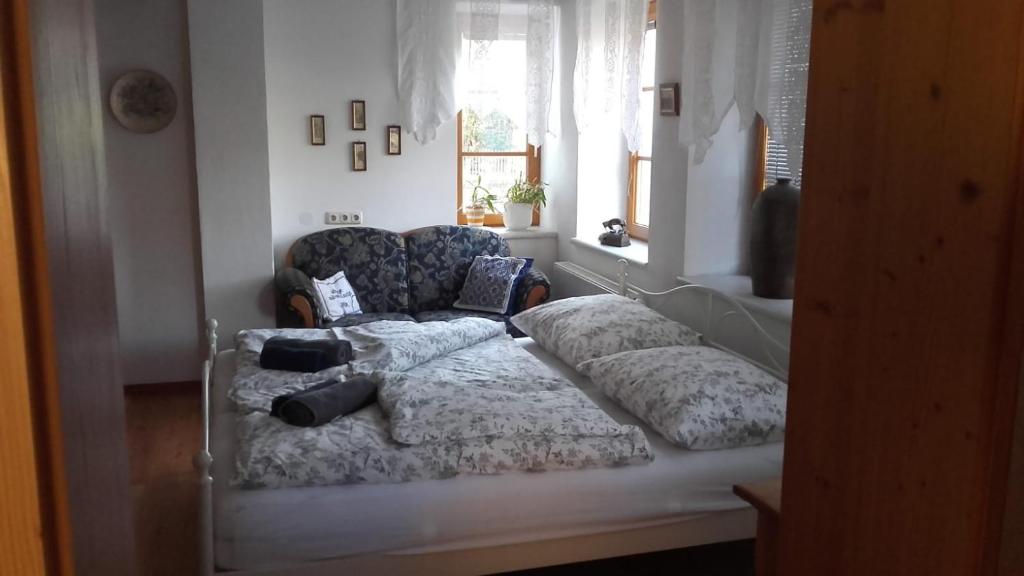 Postel nebo postele na pokoji v ubytování Auszeit