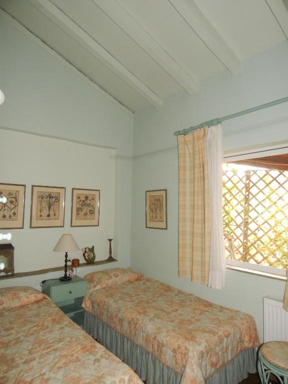 Postel nebo postele na pokoji v ubytování Palmina Mare Villa and Studios