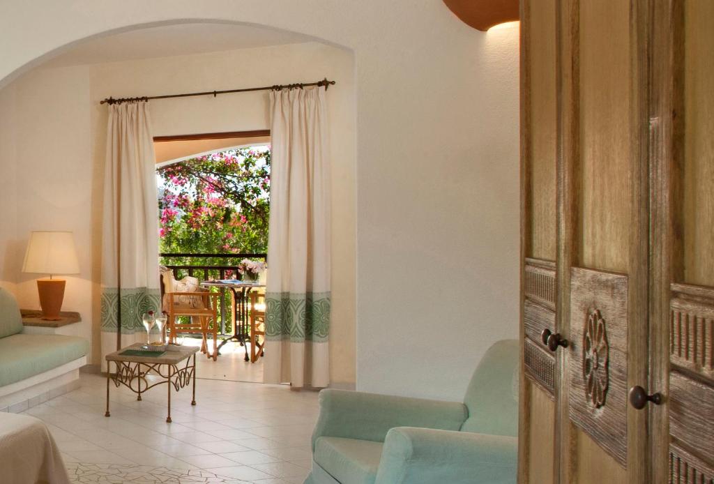 Posezení v ubytování Resort Cala Di Falco