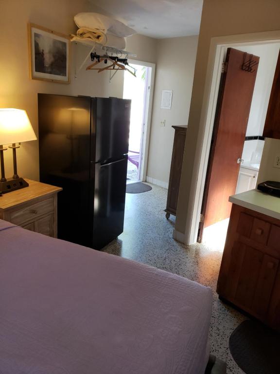 Postel nebo postele na pokoji v ubytování Siesta Motel