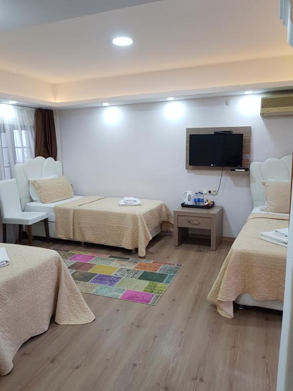 Postel nebo postele na pokoji v ubytování Alida Hotel Pamukkale