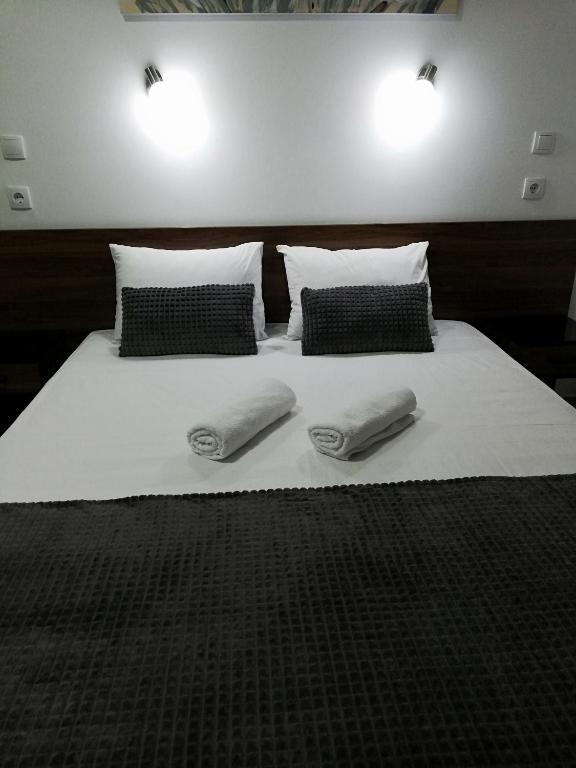 Postel nebo postele na pokoji v ubytování Apartmani Nana Sokobanja