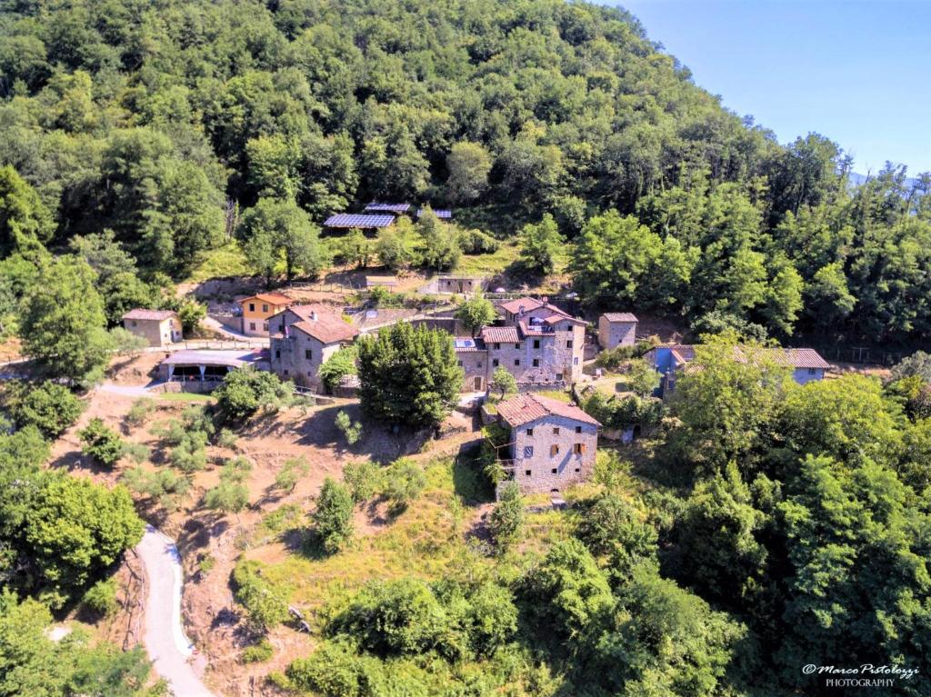 an aerial view of a village on a mountain at Agriturismo Pian di Fiume in Bagni di Lucca