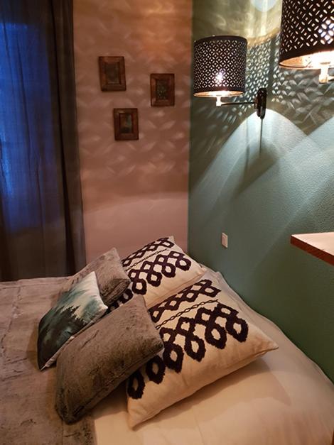 Postel nebo postele na pokoji v ubytování Lodge Hotel Les Rousses