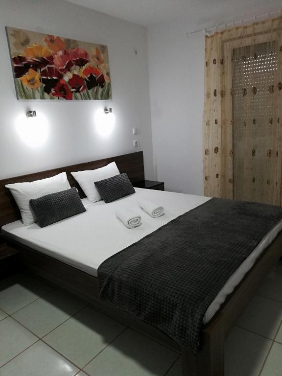 Postel nebo postele na pokoji v ubytování Apartmani Nana Sokobanja