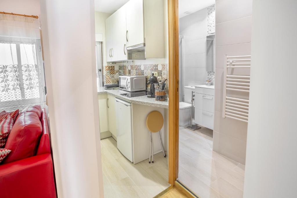 Kuchyň nebo kuchyňský kout v ubytování Apartamento Candela