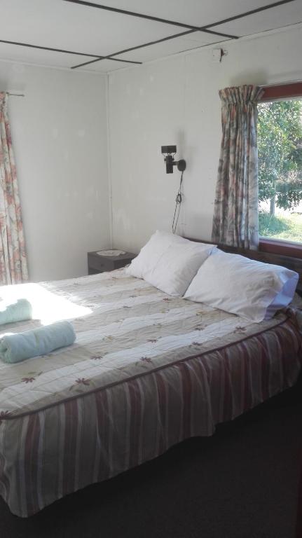 Postel nebo postele na pokoji v ubytování Laguneclub - Su casa de campo