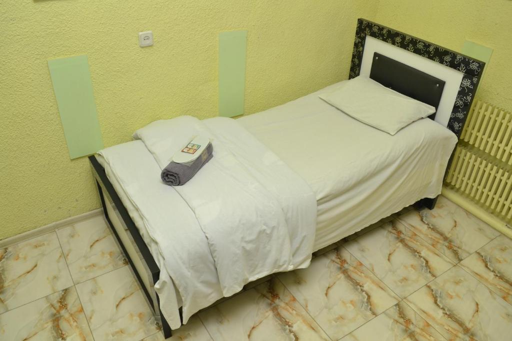 Postel nebo postele na pokoji v ubytování Oazis