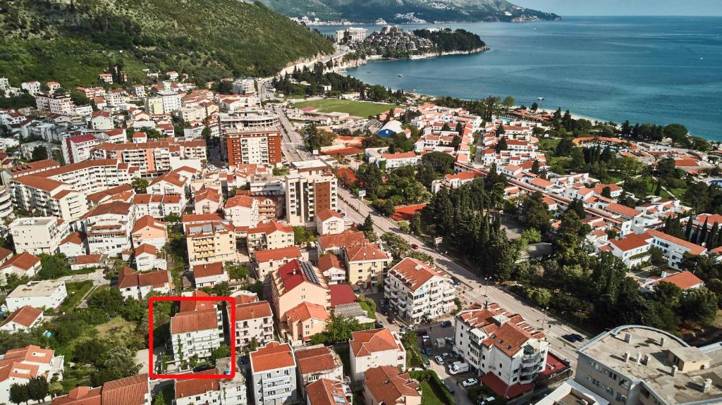 an aerial view of a city next to the water at Family Apartments Mont Budva in Budva