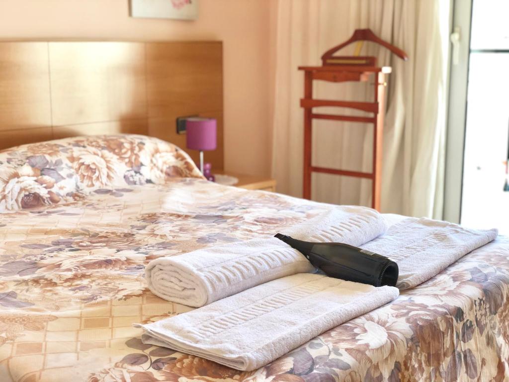 Кровать или кровати в номере Apartamentos Benet