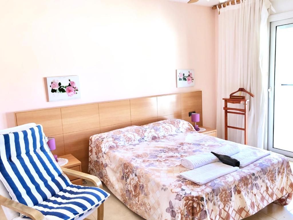 Кровать или кровати в номере Apartamentos Benet