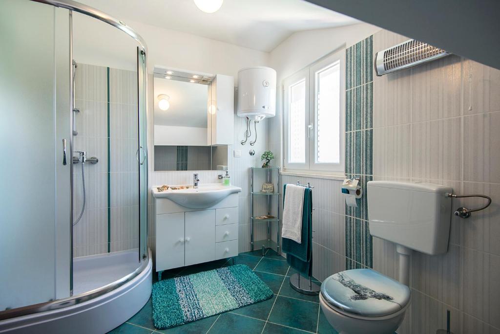 Koupelna v ubytování Apartments CAPE Deluxe