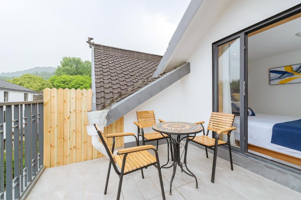 Balkón nebo terasa v ubytování Hangzhou Ziwei Boutique Homestay