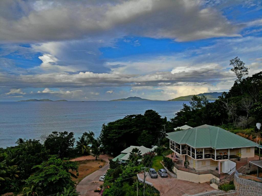 a house with a view of the ocean at Summer Self Catering in Baie Sainte Anne