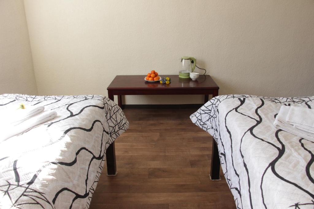 Postel nebo postele na pokoji v ubytování Snow Leopard Hostel
