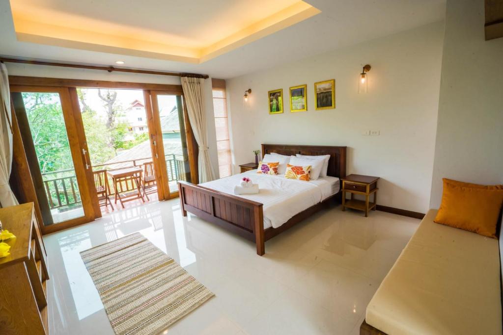 Postel nebo postele na pokoji v ubytování Anyamanee Resort