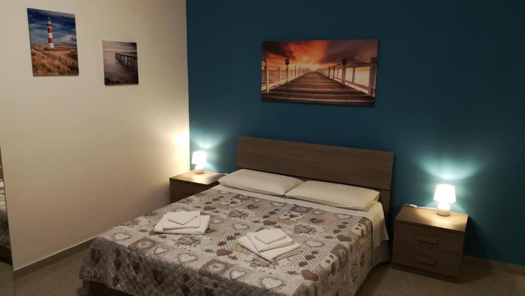 Łóżko lub łóżka w pokoju w obiekcie Bed Cafe
