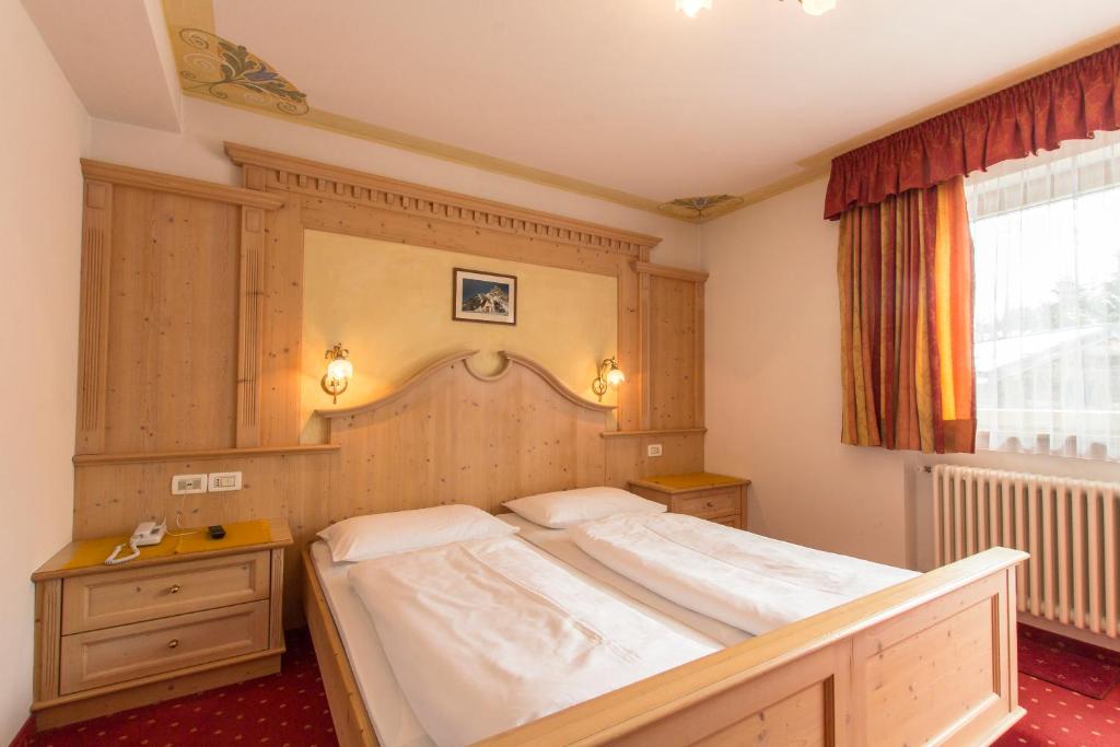 Postel nebo postele na pokoji v ubytování B&B Apartments La Palsa