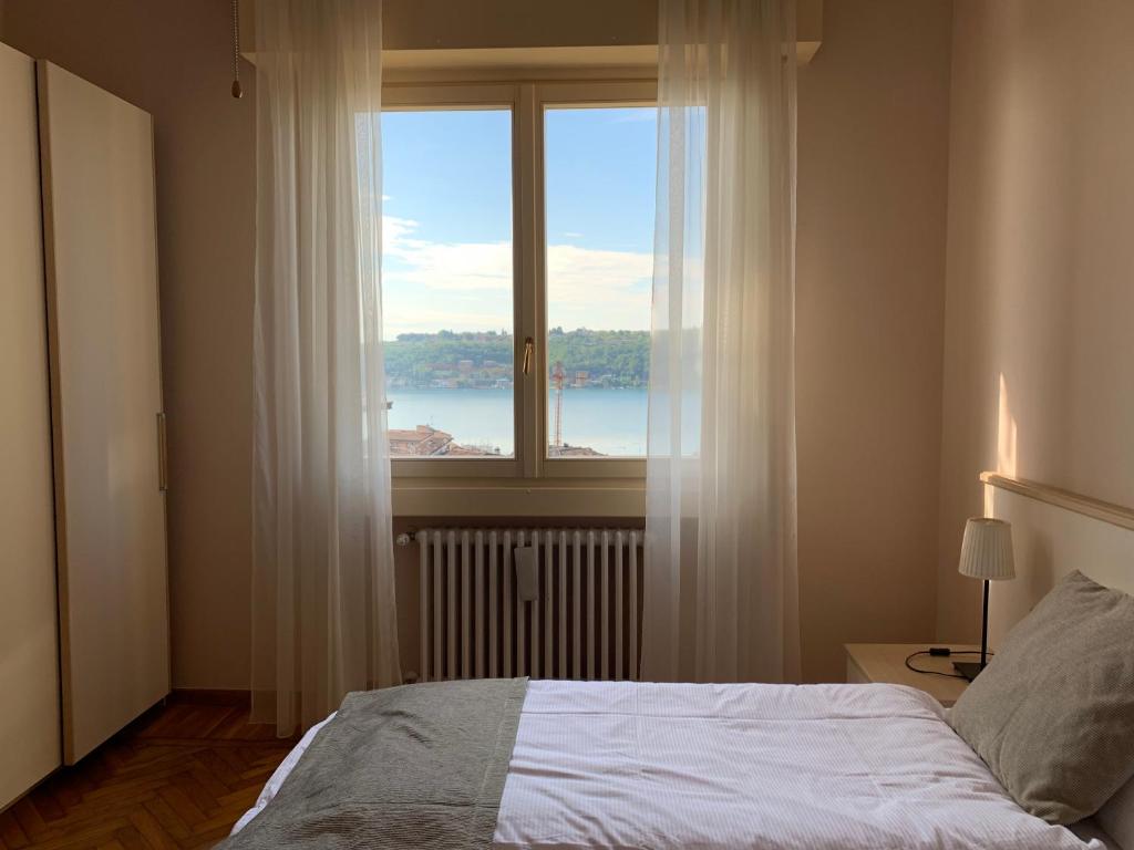 Postel nebo postele na pokoji v ubytování Villa Ai Colli