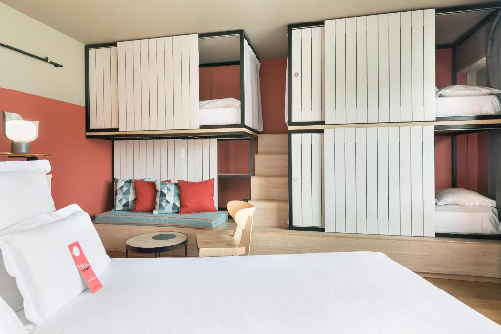 Postel nebo postele na pokoji v ubytování Hotel Kaijoo by HappyCulture