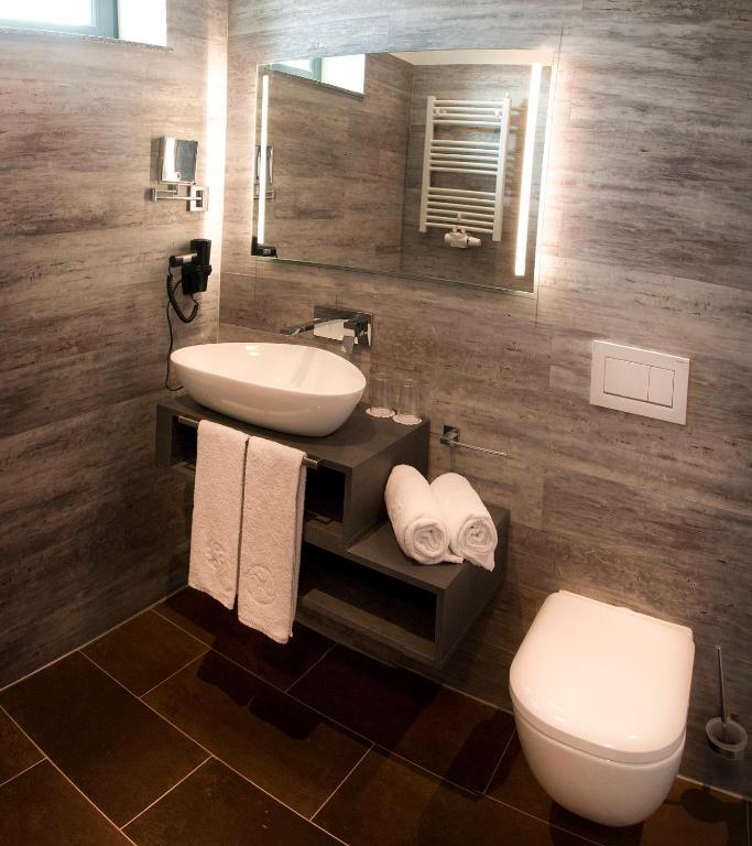 Koupelna v ubytování premium by GS Hotel