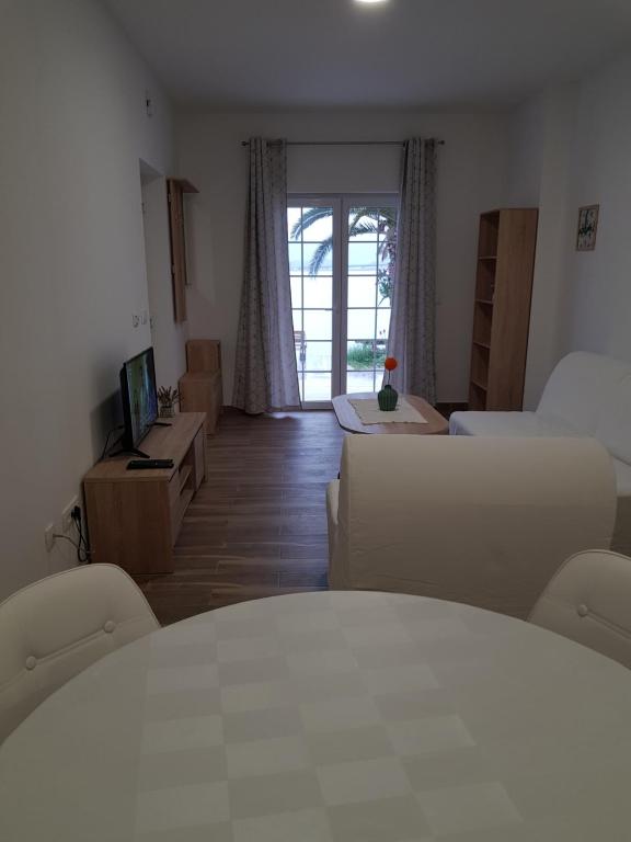 Postel nebo postele na pokoji v ubytování Apartments Damić