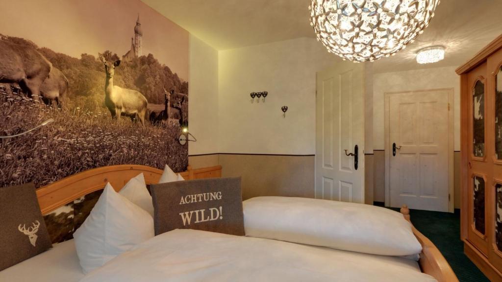 Postel nebo postele na pokoji v ubytování Boutique Hotel POST ANDECHS