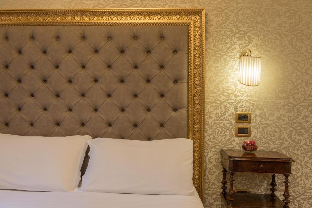 Postel nebo postele na pokoji v ubytování Palazzo Bembo - Exclusive Accommodation
