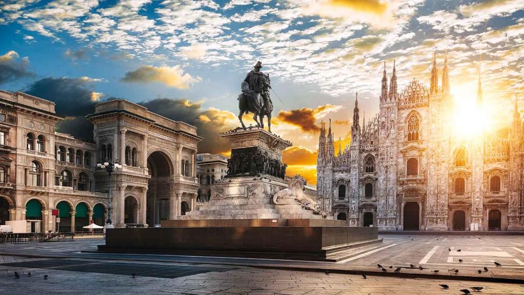 a statue of a man on a horse in front of a building at Hotel MM Dateo in Milan