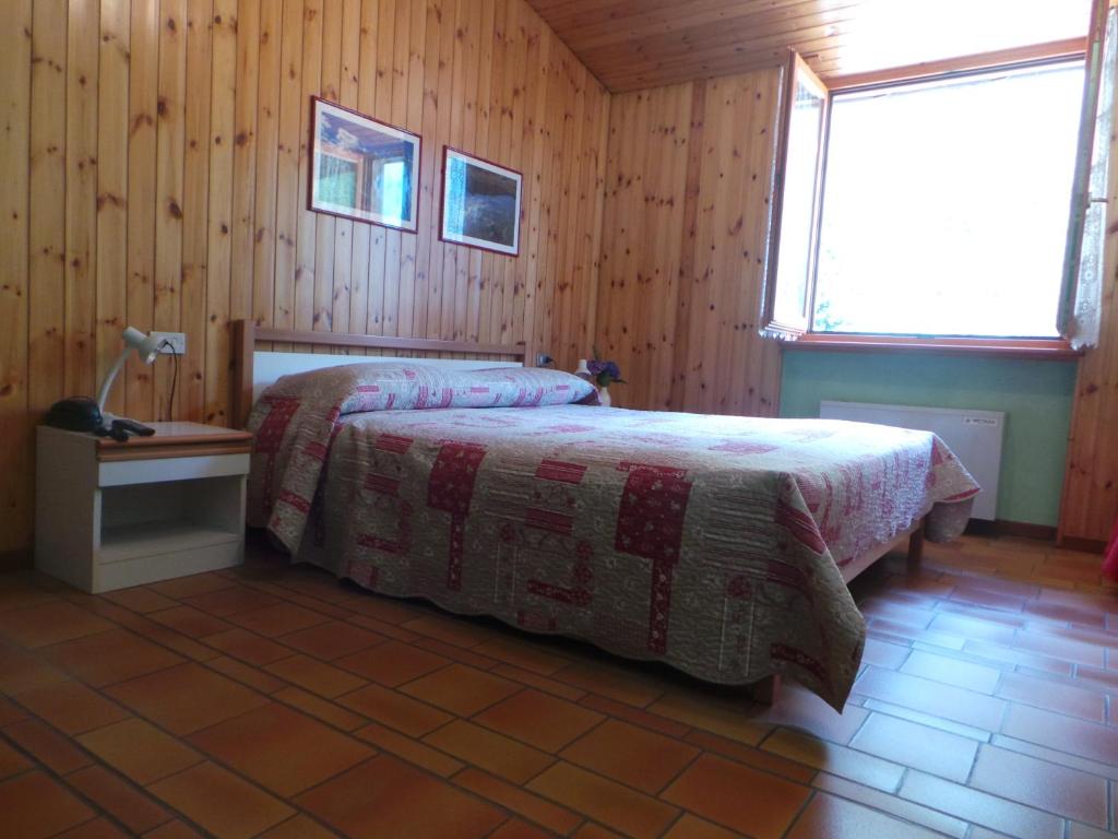 Łóżko lub łóżka w pokoju w obiekcie Hotel Corona