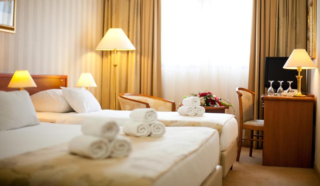 Postel nebo postele na pokoji v ubytování Hotel Globo