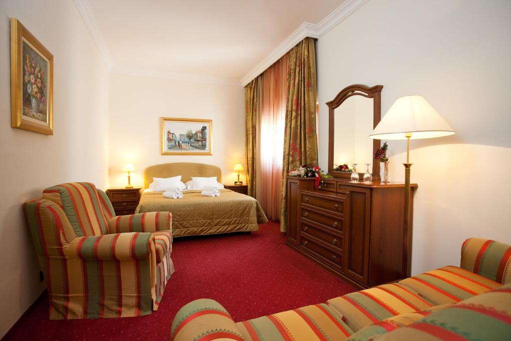 Postel nebo postele na pokoji v ubytování Hotel Globo
