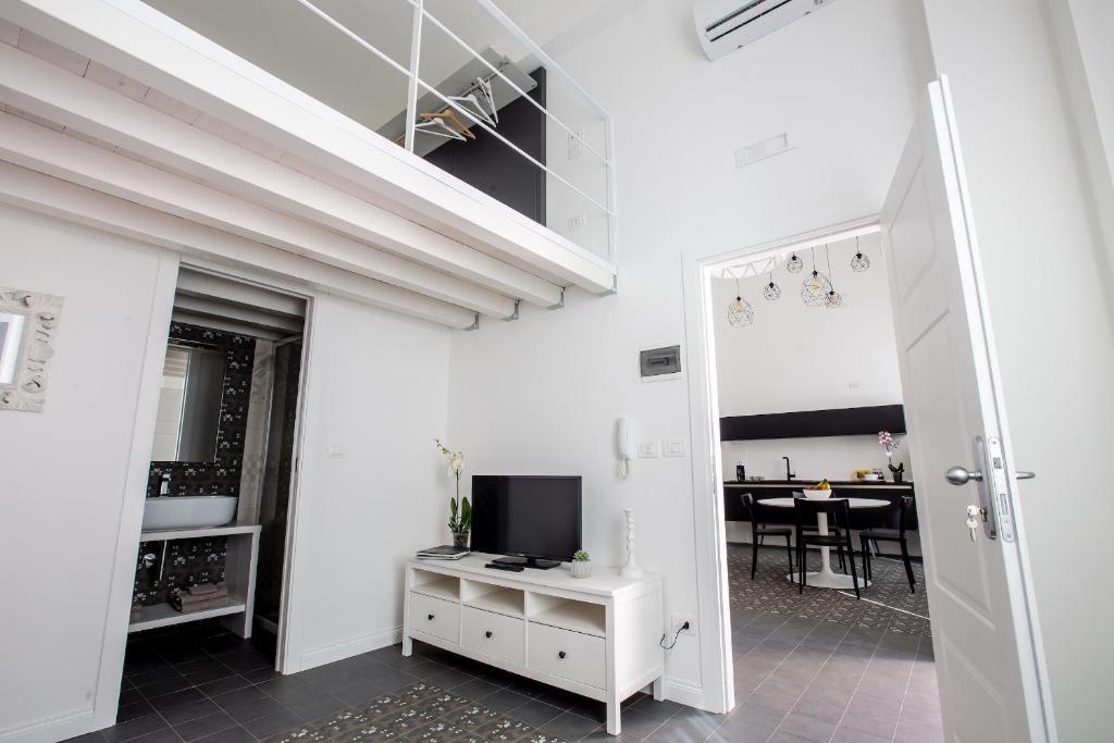 TV a/nebo společenská místnost v ubytování Aruci b&b