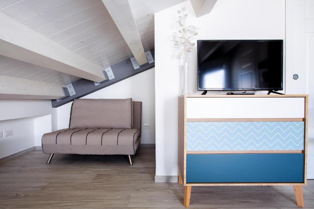 TV a/nebo společenská místnost v ubytování Aruci b&b