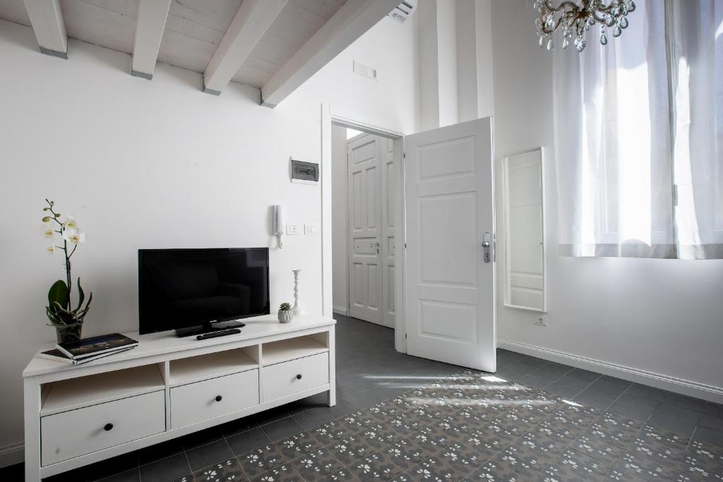 TV a/nebo společenská místnost v ubytování Aruci b&b