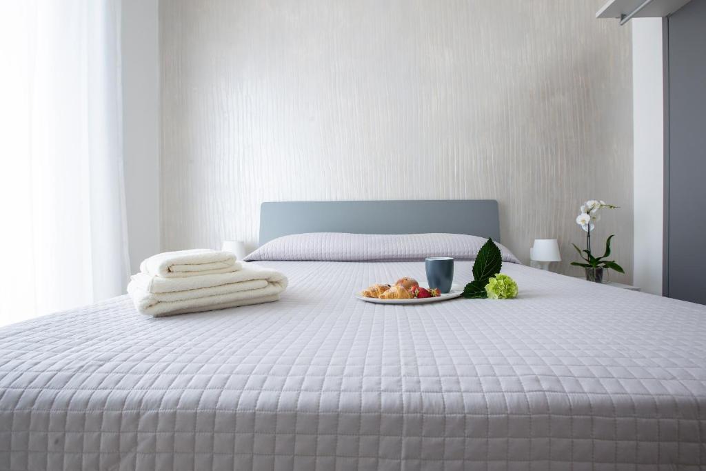 Postel nebo postele na pokoji v ubytování Aruci b&b