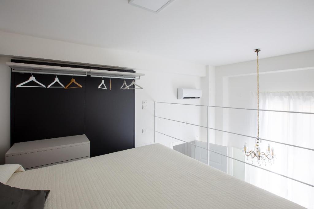 Postel nebo postele na pokoji v ubytování Aruci b&b