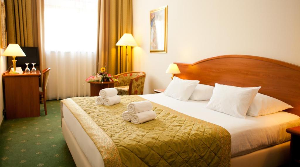 Postel nebo postele na pokoji v ubytování Hotel Globo