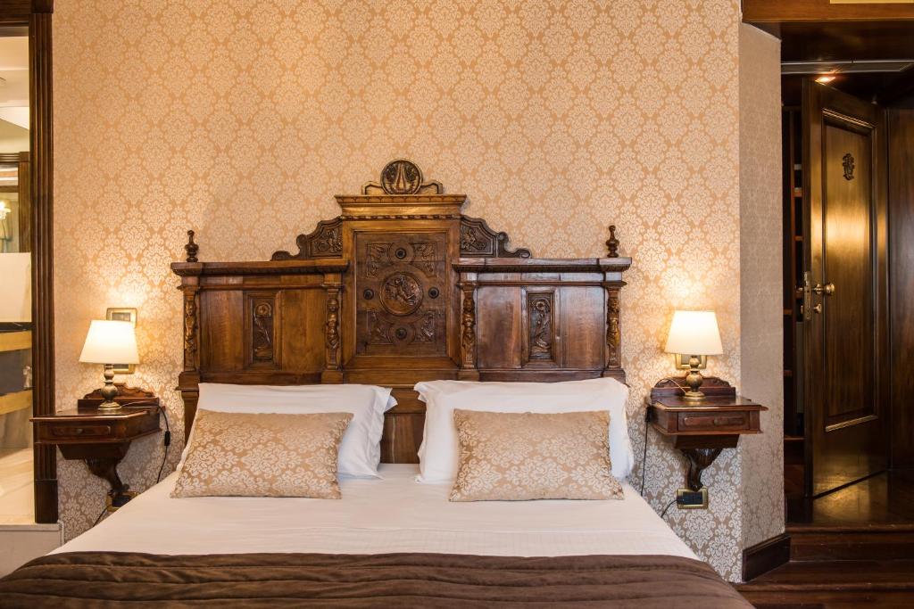 Postel nebo postele na pokoji v ubytování Palazzo Bembo - Exclusive Accommodation