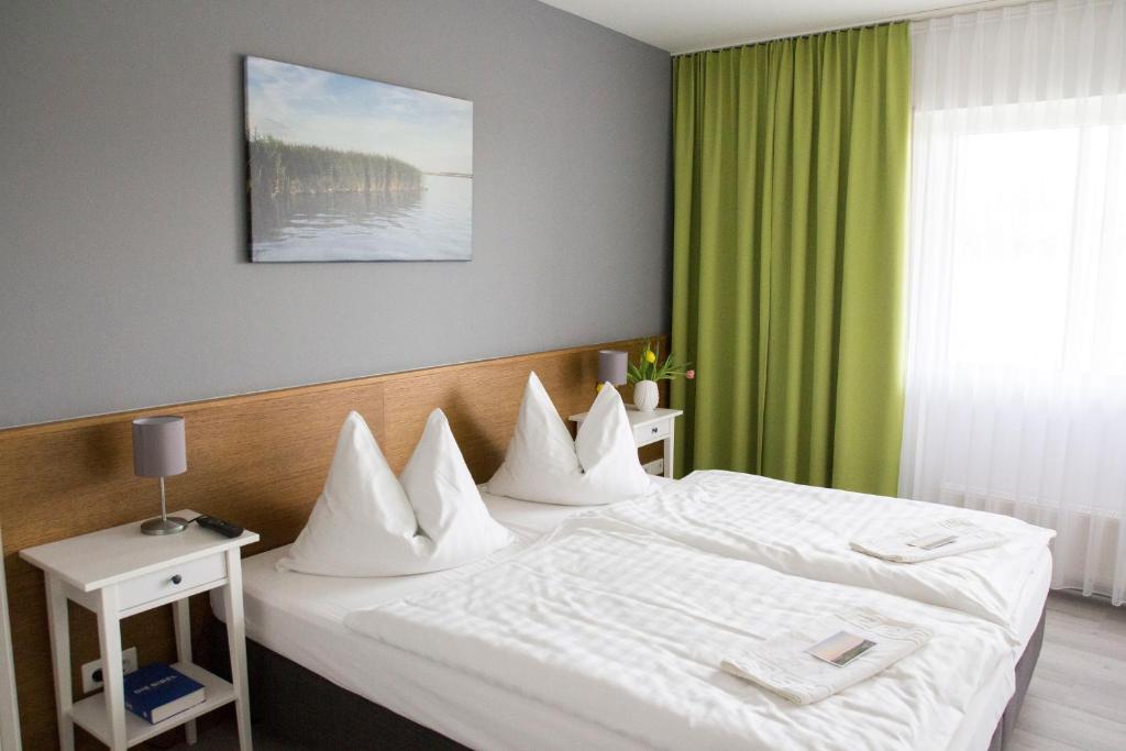 Postel nebo postele na pokoji v ubytování Ferienland Salem