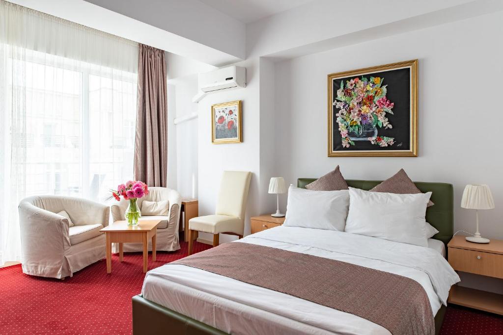 Postel nebo postele na pokoji v ubytování Bucur Accommodation